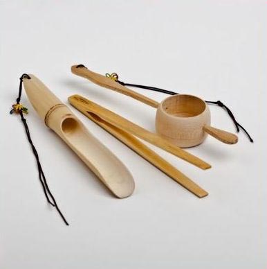 Bamboo tea scoop, tongs and strainer.