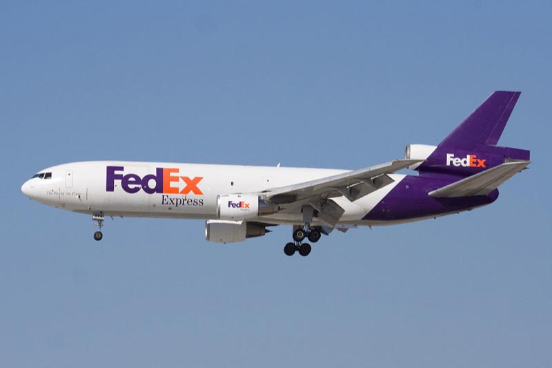 A FedEx Express MD-10 landing at San Jose International Airport.