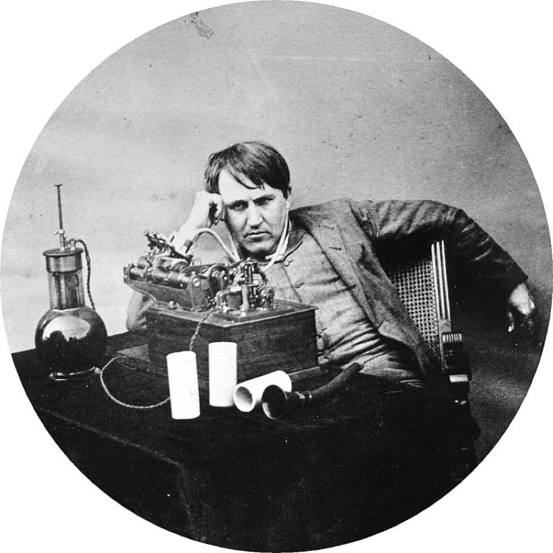 Thomas Edison with early version of phonograph.